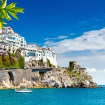 Morning view of Amalfi cityscape on coast line of mediterranean sea, Italy