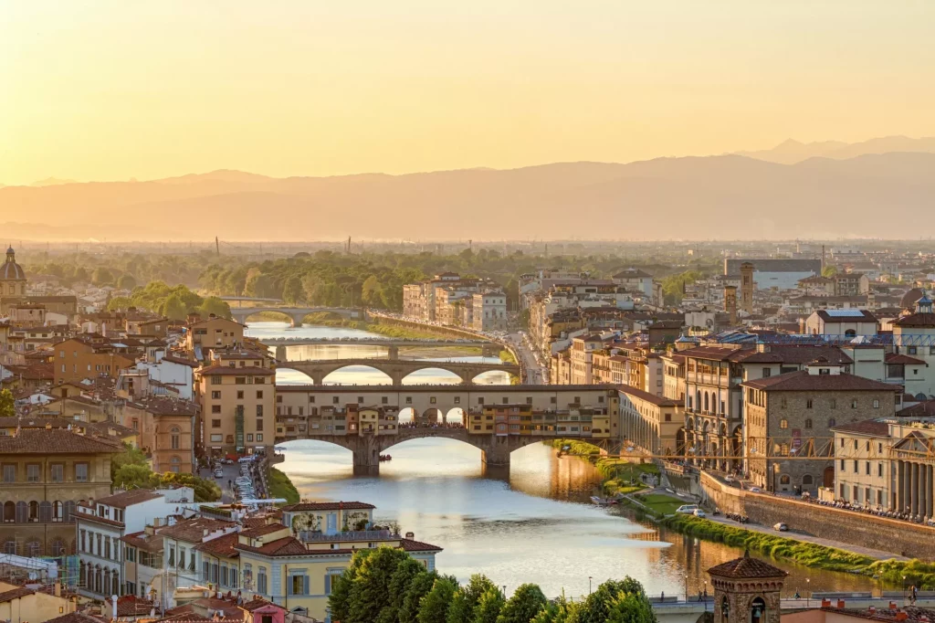 Ponte Vecchio Bridge and the Arno River in Florence at dusk