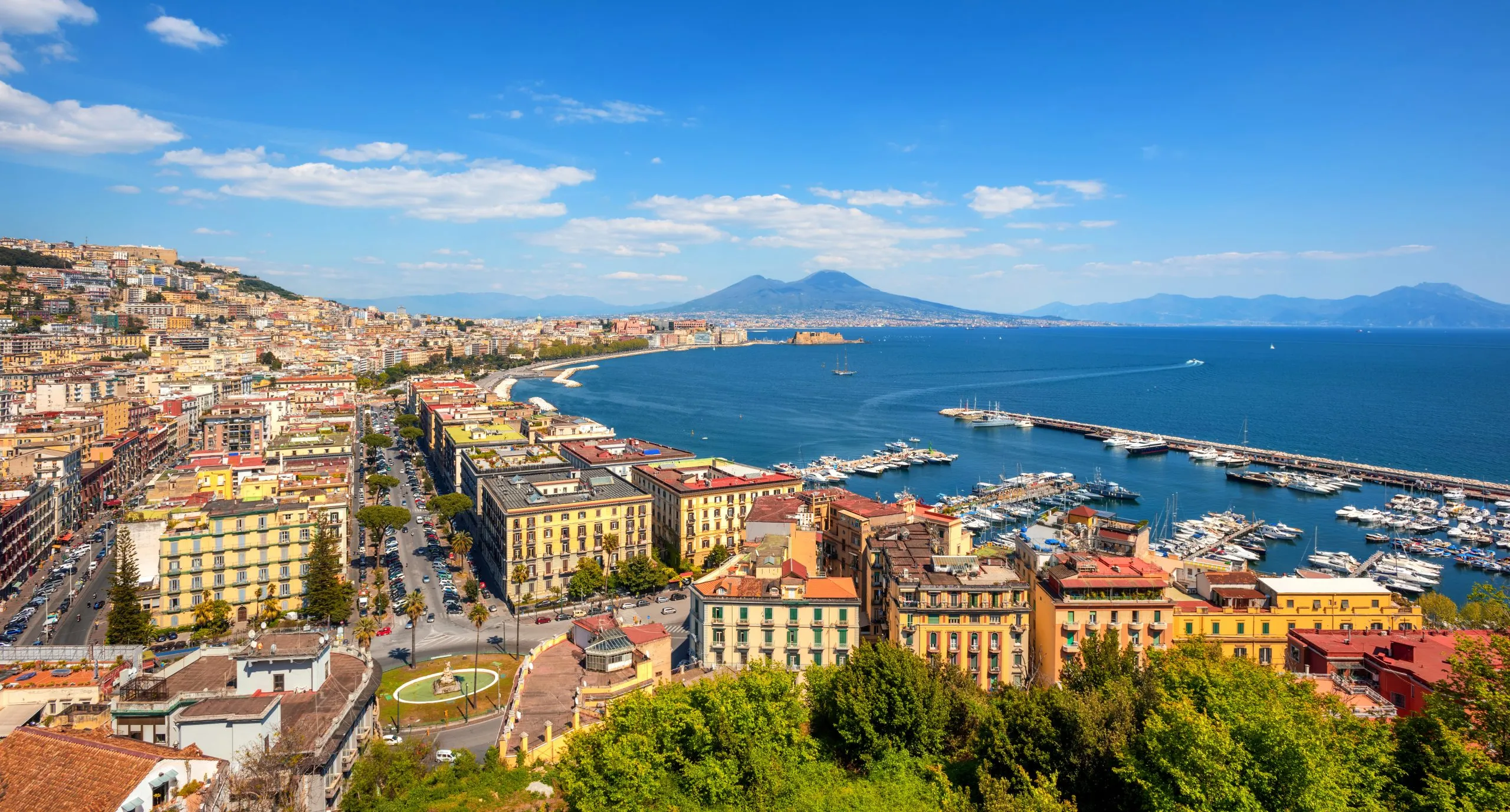 Panoramic view of Naples city, Chiaia neighborhood, Mount Vesuvius and gulf of Napoli, Mediterranean sea, Italy