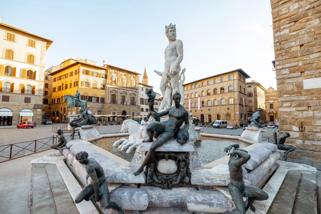 Morning view on fountain of Neptune on Signoria square in Florence. Concept of art and architecture of the italian renaissance