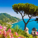 Scenic picture-postcard view of famous Amalfi Coast with Gulf of Salerno from Villa Rufolo gardens in Ravello, Campania, Italy.