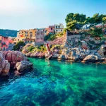 Sunny spring view of Sant' Elia village. Splendid azure water bay on Sicily, Palermo city location, Italy, Europe. Traveling concept background.